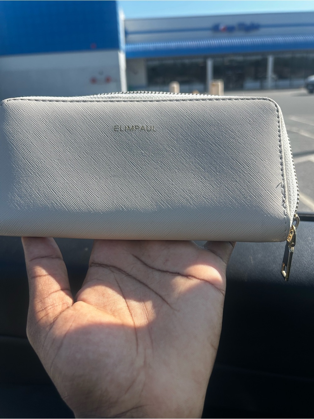 DKNY Zip-Around Wallet in Light Gray with Gold Hardware